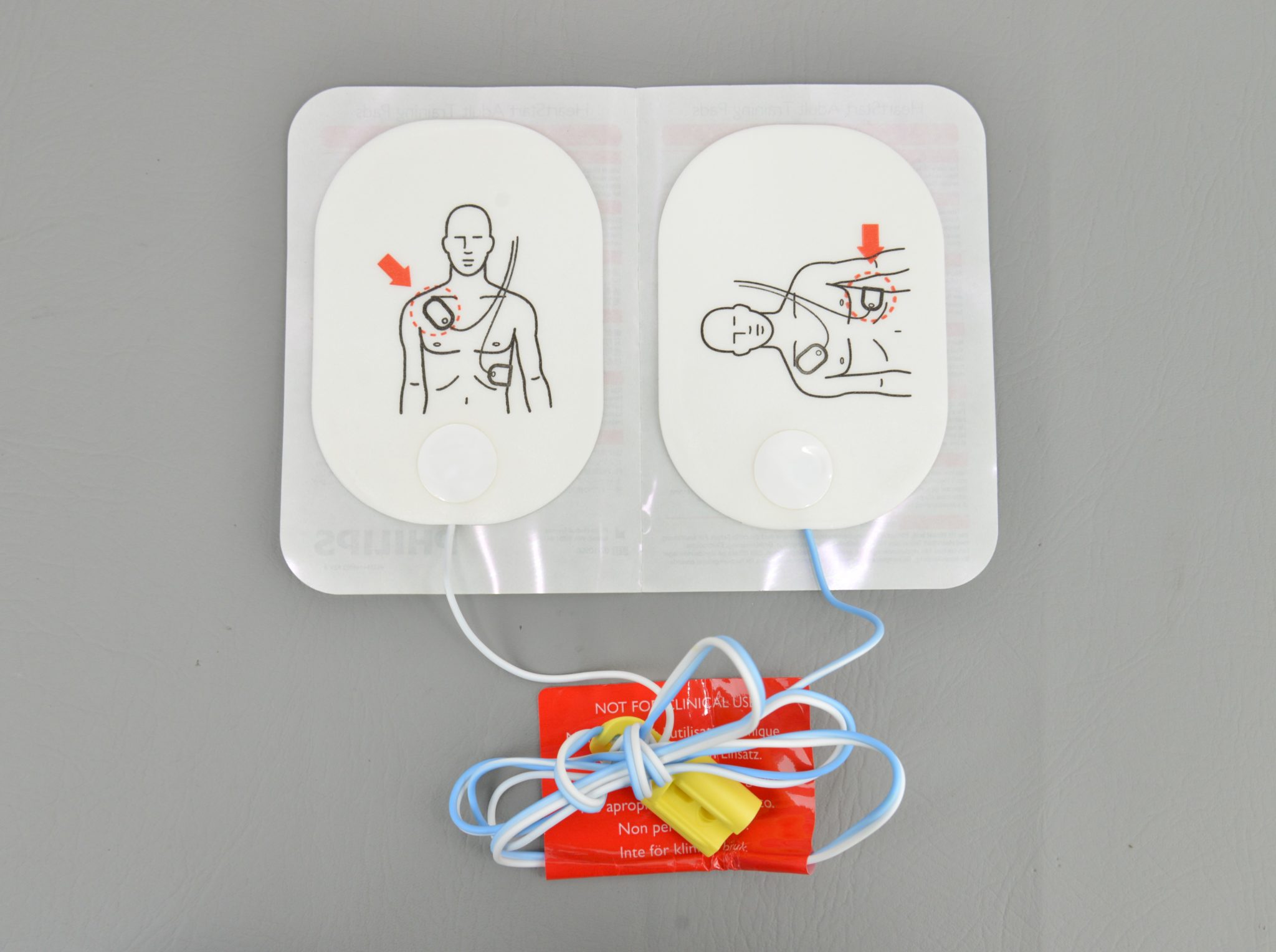 New Laerdal AED Trainer 2 w Philips HeartStart Adult Training Pads